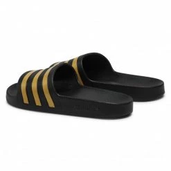 Mules Et Sandales Mules / Sandales De Bain Adidas - Adilette Aqua EG1758 Cblack/Goldmt/Cblack Noir -Chaussures Femme Soldes 0000207779907 02 rz